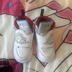 Jordan Kids White Sneakers with Red and Blue Accents